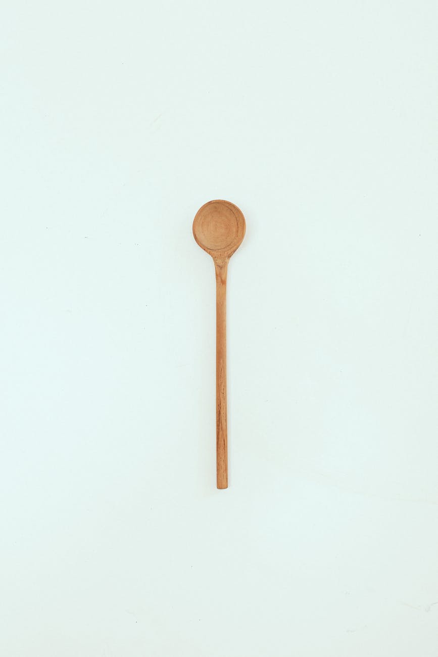 wooden spoon on white surface